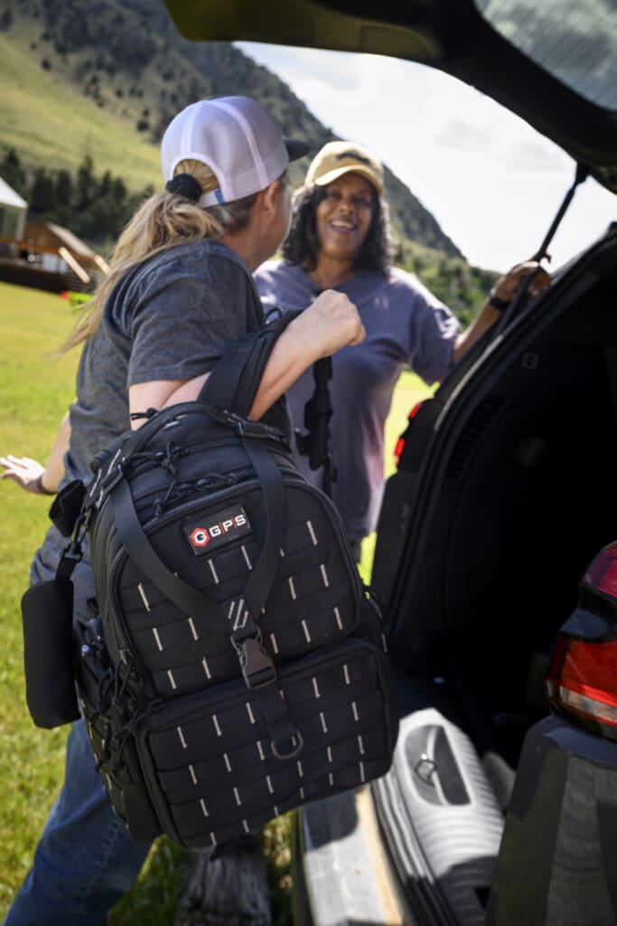 range bag with two women at range