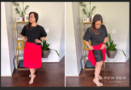 a woman in a red skirt with thigh shorts holster