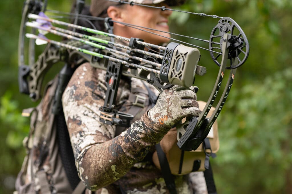 girl with bow for archery hunting