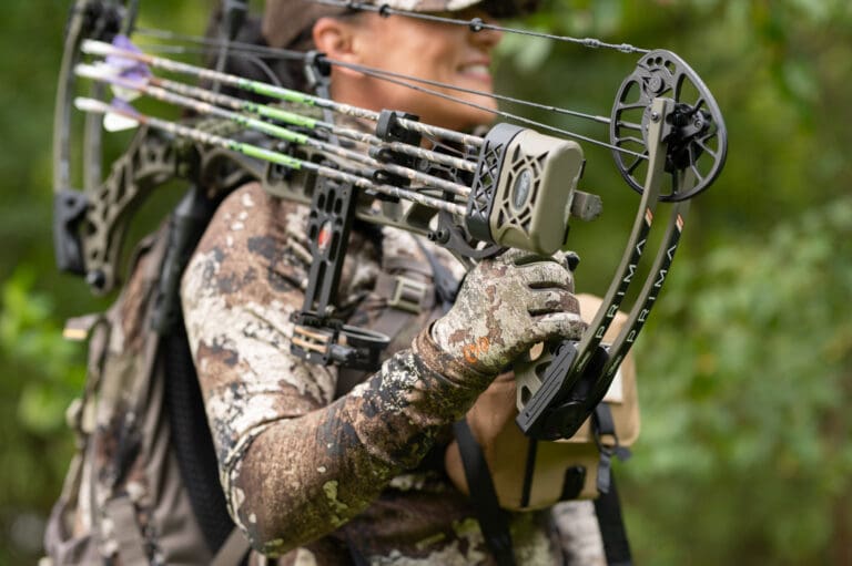 girl with bow for archery hunting