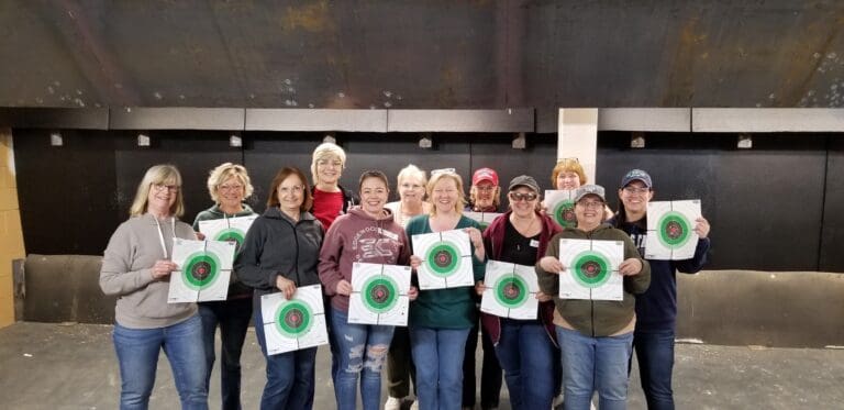 women at range with targets