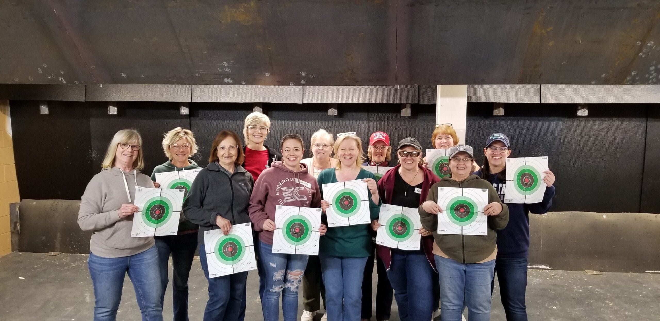 women at range with targets
